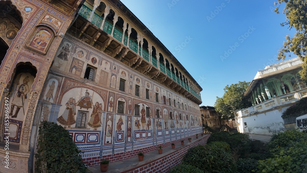 Obraz premium Detailed View of Medieval Period Haveli Interior Walls with Ornate Fresco Murals and Traditional Patterns, Nawalgarh Rajasthan, India