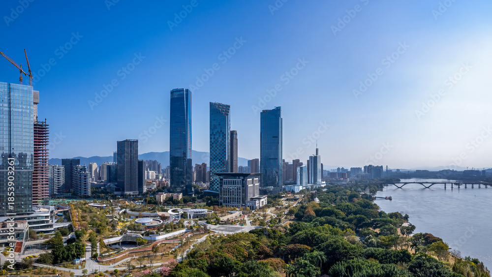 Fototapeta premium Modern City Skyline with Skyscrapers and River