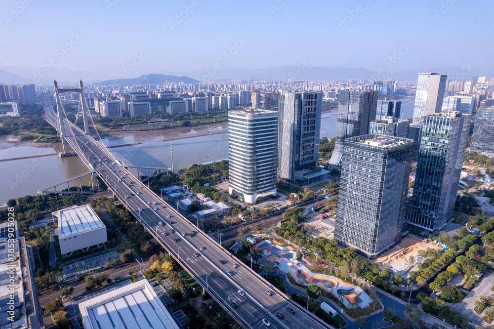 Obraz premium Aerial View of Modern Urban Architecture and Bridge