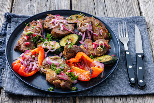 Grilled pork neck chunks with roasted veggies