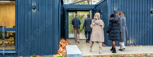 Banner of business professionals entering to coworking office building made with shipping containers