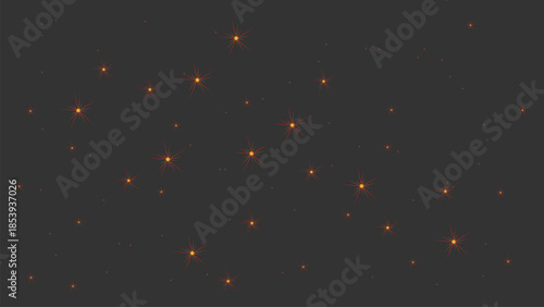 Orange and yellow starbursts scattered on a dark gray background