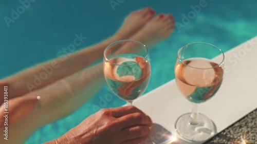 Drinking rose wine in the pool, pool bar, luxury garden, villa