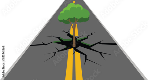 Cracked road with tree growing through it