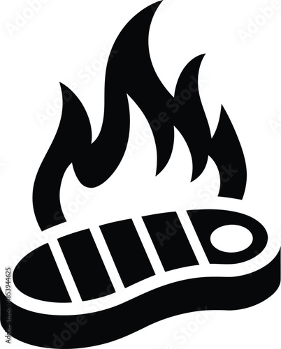 Burning shoe on fire with flames rising