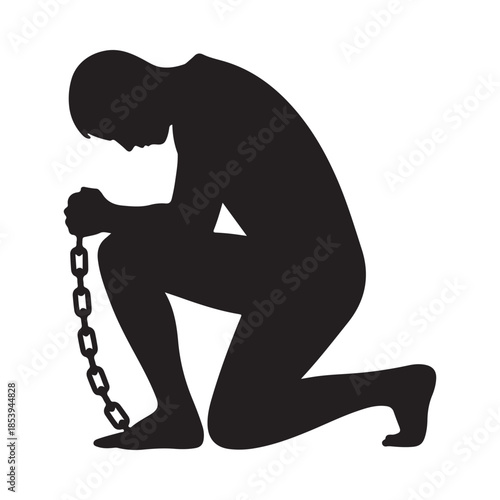 Silhouette of a kneeling man holding a chain symbolizing burden or captivity