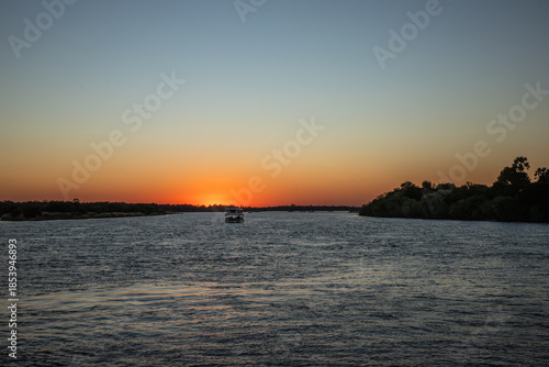 Cruising the Zambezi River, in Zimbabwe, Africa, at sunset