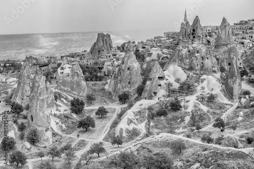 Aerial view of the typical Cappadocian landscape in the area of ​​Uçhisar Castle, Türkiye, in black and white