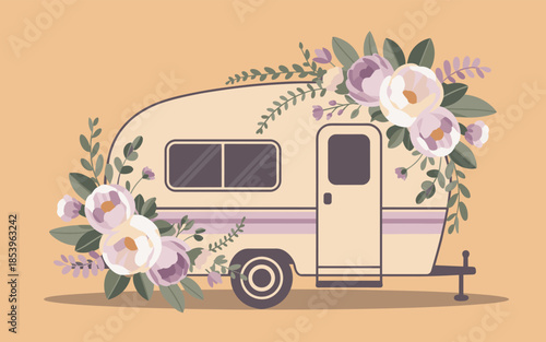 A vintage caravan adorned with flowers stands serenely against a soft peach background