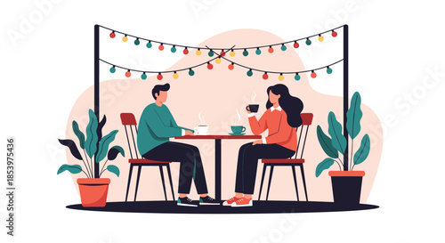 Romantic couple enjoying a warm cup of coffee while sitting at a table in an outdoor cafe decorated with hanging string lights at nighttime.