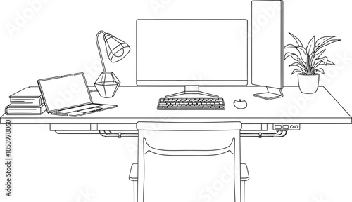 A well organized home office workspace with computer and laptop on a desk