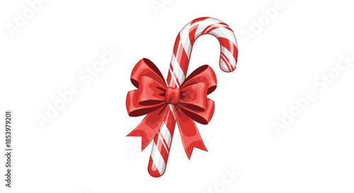 A classic Christmas candy cane with red and white stripes tied with a beautiful and large red ribbon bow isolated on a white background.