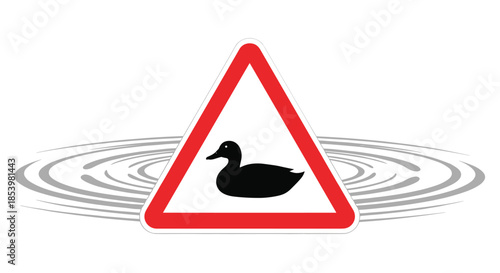 Triangular road warning sign with a duck silhouette, indicating an animal crossing area, with water ripples in the background.