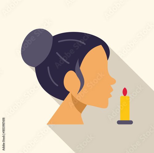 Profile of woman blowing out candle during a spa treatment, enjoying wellness and relaxation