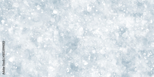 Abstract light blue grunge background with bokeh effect snowflakes texture. Soft sky-blue paint aquarelle hand-painted watercolor background design. beautiful bright blue paper texture.