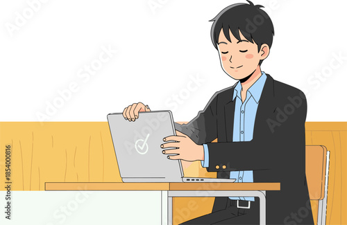 A young professional smiles while working on a laptop in a classroom setting. Focused and determined, he?s dressed formally. Bright light highlights the screen.