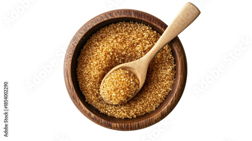 Sweet brown sugar. natural sweetener. wooden bowl and spoon.