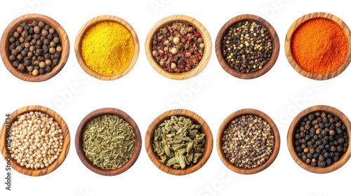 Assortment of spices in bowls: peppercorns, turmeric, paprika, herbs. Isolated background.