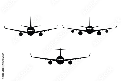 Silhouettes of commercial airplanes in flight a simple graphic representation