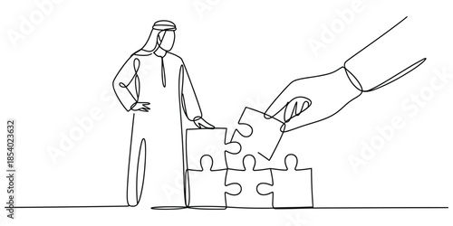 Arab businessman completing puzzle with help, business strategy concept