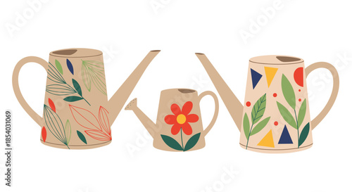 Three decorative garden watering cans with various floral and geometric patterns in soft earthy and bright colors.