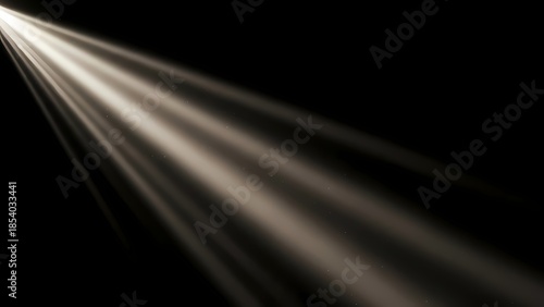 Elegant spotlight beams on a black background creating a dramatic and visually striking stage lighting effect for theater, concert, or photography backdrop with high contrast and depth