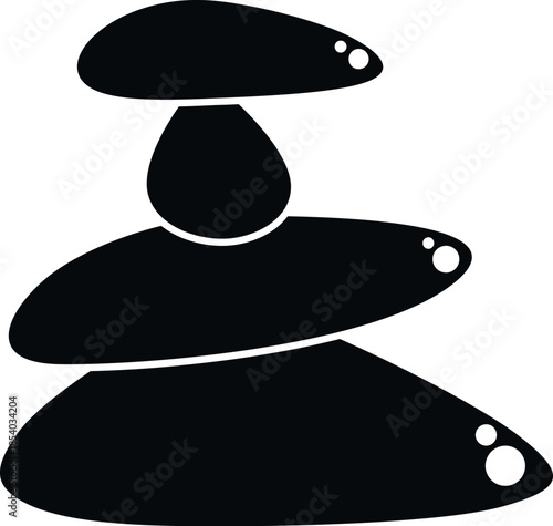 Stacked balancing cairn stones creating a spiritual and tranquil silhouette icon