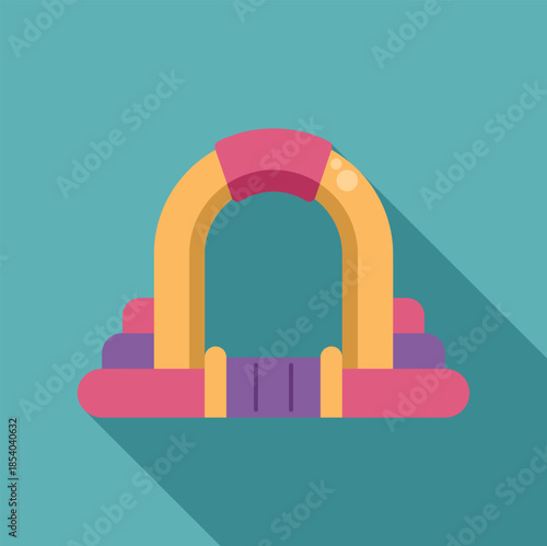 Inflatable playground arch with steps and colorful design, generating a long shadow