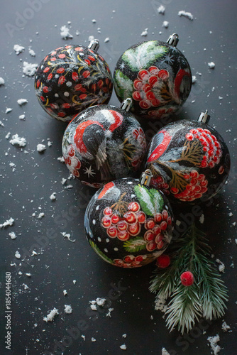 Composition of New Year's balls painted with Petrykivka painting