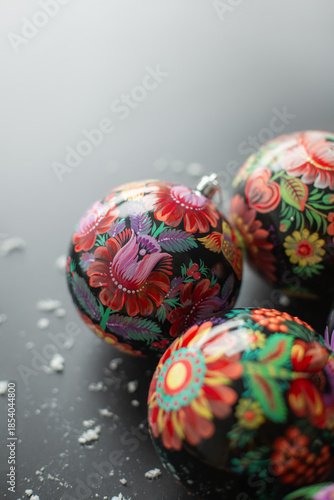 Composition of New Year's balls painted with Petrykivka painting