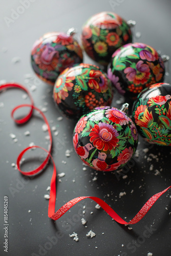 Composition of New Year's balls painted with Petrykivka painting