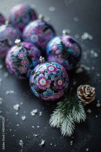 Composition of New Year's balls painted with Petrykivka painting