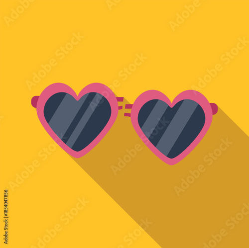 Pink heart shaped sunglasses casting a strong long shadow on a yellow background