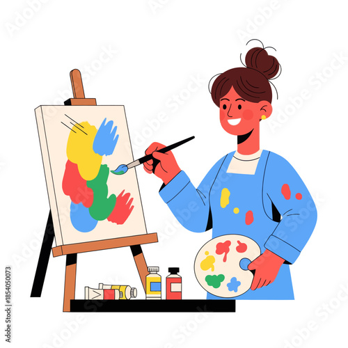 A cheerful young artist with a bun hairstyle creating colorful abstract artwork on canvas using