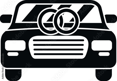 Front view of a wedding car displaying interlocking rings on the windshield