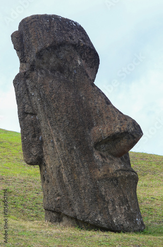 Moai Statue at Rano Raraku, Easter Island in Lush Greenery