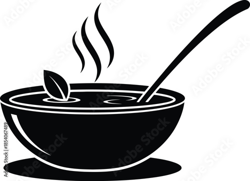 Hot soup in a bowl with spoon