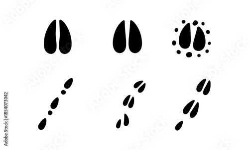 Collection of black animal hoof and paw prints on a white background