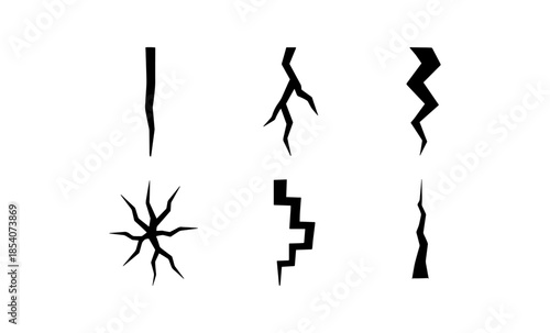 Collection of six black crack icons on a white background for design elements
