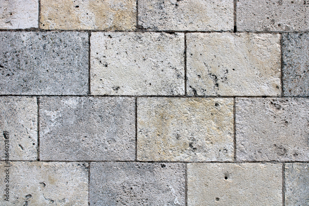 Fototapeta premium Mur en pierre de taille, pierre rectangulaire