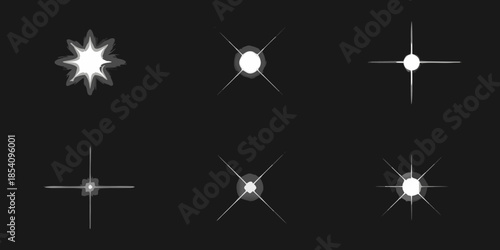 A collection of bright stylized starbursts and sparkling light effects on black