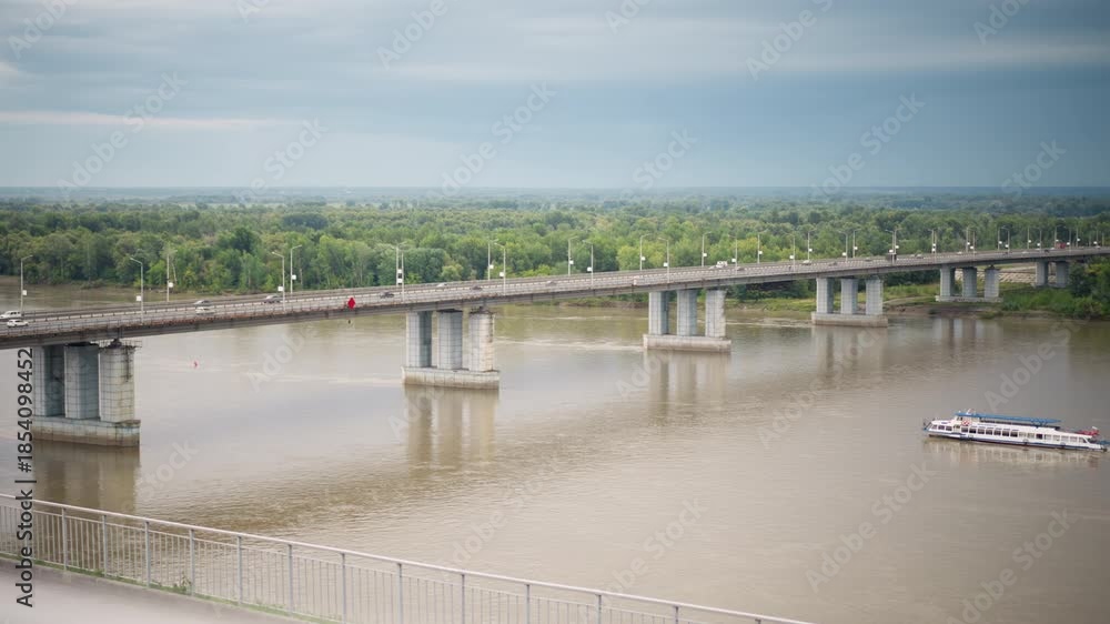 custom made wallpaper toronto digitalferry passing beneath concrete highway bridge during cloudy weather, pilot navigating between massive pillars, inspector checking structure, commuters photographing river, wake reflecting pillar