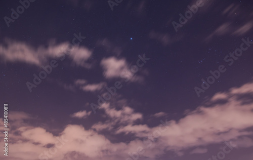 Starry night sky with clouds. Night sky  background.