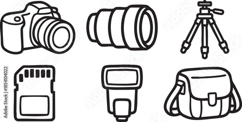 Black and white of camera equipment and accessories lens tripod memory card