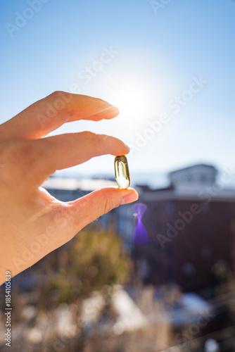fish oil Omega-3 capsule or fish oil Omega-3 supplement close up. Healthy eating, medicine, health care, food supplements concept