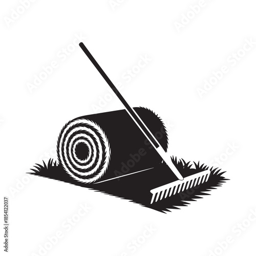 Black and white illustration of a rolled turf of grass and a garden rake