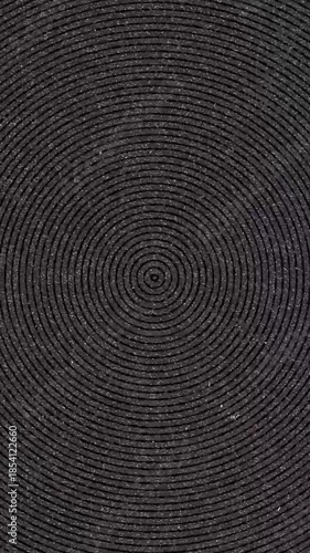 Concentric circles pattern on dark background, close up view
