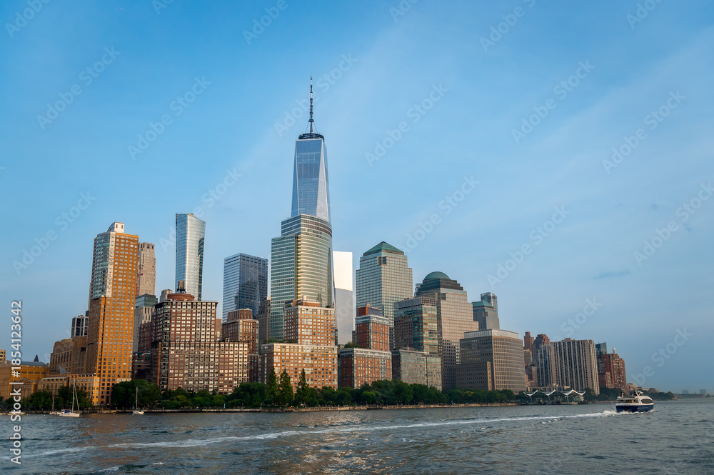 Obraz premium Panorama of Manhattan skyscrapers. Wide aerial view of Manhattan skyscrapers stretching along the Hudson River.