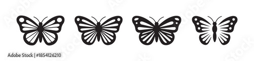 Group of four decorative butterfly icons with spread wings isolated on white
