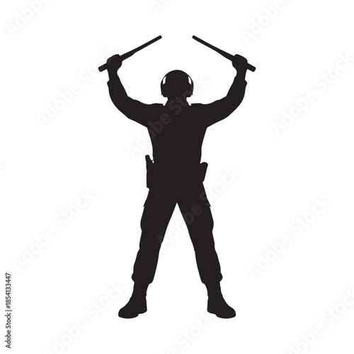 Silhouette of a police officer raising batons in a strong pose